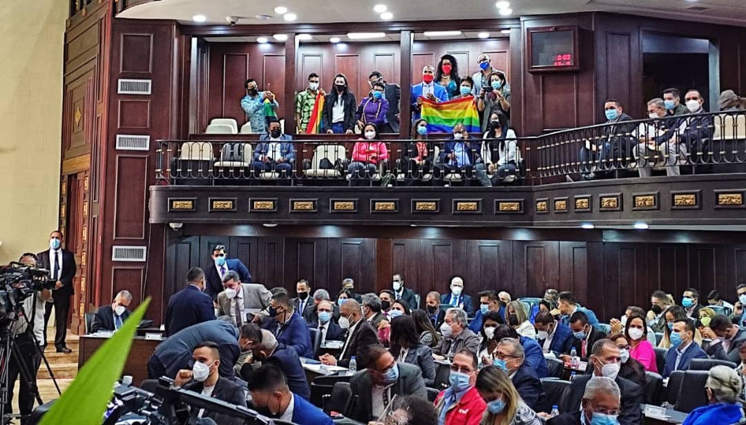 Featured image: The LGBTQ flag raised on Venezuelan National Assembly. Photo courtesy of @VE_Igualitaria .