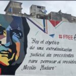 Featured image: Street mural in Caracas with the face of Alex Saab and the caption “I’m the object of an unprecedented legal persecution to oust President Nicolas Maduro.” File photo.