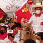Featured image: Progressive Peruvian presidential candidate Pedro Castillo riding a horse during a political rally. File photo.