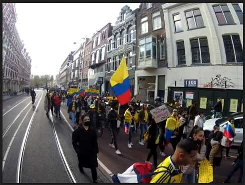Featured image: Strong solidarity with Colombia in the Netherlands, with those fighting for democracy and against human rights violations from the Ivan Duque/Alvaro Uribe government. Photo courtesy of Hands Off Venezuela - Netherlands.