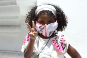 Featured image: Venezuelan kid wearing her face mask. File photo.