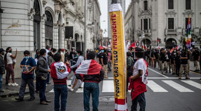 Supporters of the Peru Libre candidate, Pedro Castillo, protest in front of the headquarters of the National Elections Jury, Lima, June 9, 2021.