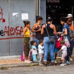 Graffiti near a shop in Caracas calling for the release of Alex Saab, with the hashtag #Freealexsaab. Photo: Alamy
