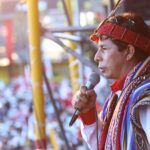 Candidate Pedro Castillo with an indigenous outfit during a political rally. File photo.