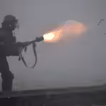 A riot police officer in Cali. Photograph: Luis Robayo/AFP/Getty Images