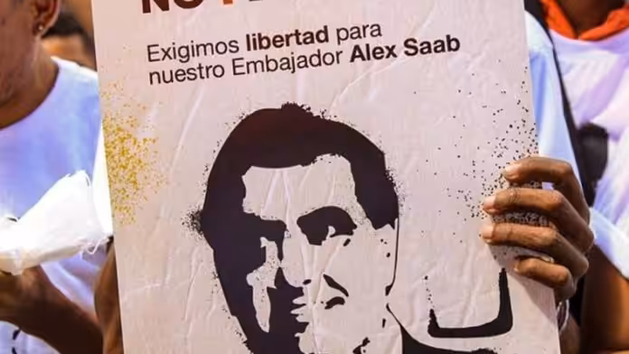 Poster reading "we demand freedom for our ambassador Alex Saab." File photo.