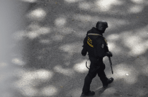 Featured image: CICPC Special Force agent walking near Plaza Madariaga in El Paraiso, Caracas on July 8, 2021. Photo by of Orinoco Tribune.