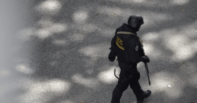 Featured image: CICPC Special Force agent walking near Plaza Madariaga in El Paraiso, Caracas on July 8, 2021. Photo by of Orinoco Tribune.