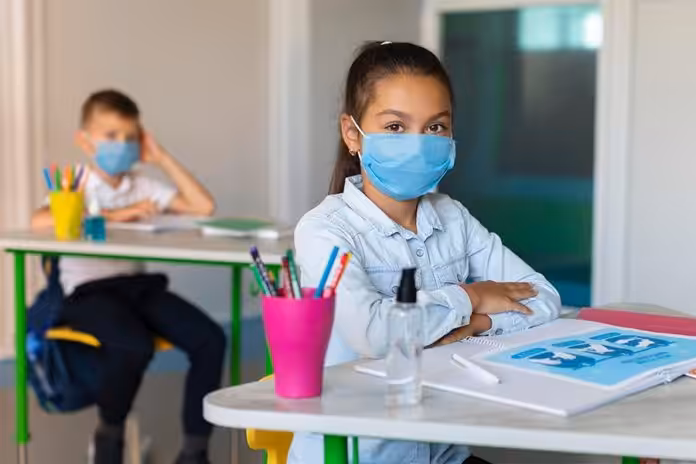 Venezuelan kids wearing face masks in a classroom. File photo.