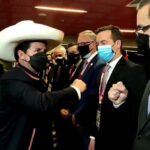 eruvian President Pedro Castillo pounding fists with Venezuelan Minister for Foreign Affairs, Jorge Arreaza. Photo courtesy of VTV.