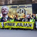 Julian Assange - Melbourne protest with big banner celebrating Assange birthday.
