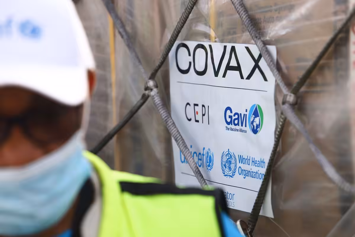 A COVAX-GAVI tag on a shipment of COVID-19 vaccines at the Kotoka International Airport in Accra. Photo by NIPAH DENNIS/AFP via Getty Images.