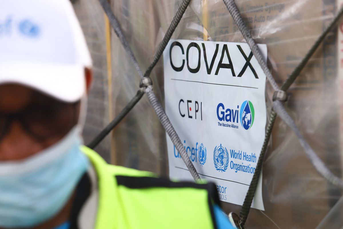A COVAX-GAVI tag on a shipment of COVID-19 vaccines at the Kotoka International Airport in Accra. Photo by NIPAH DENNIS/AFP via Getty Images.