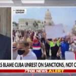Featured image: Exact moment when Fox News presented a video of a demonstration in Cuba as a rally against the government when in reality it was a rally in favor of the Cuban Revolution and they blurred some posters in the video evidencing that fact. Screenshot of the video courtesy of Fox News.