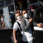 Venezuelans on  public transport. Wearing face masks and acting responsibly. File photo.