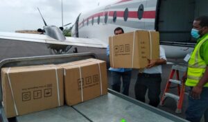 COVID-19 test kits donated by Venezuela being unloaded in the island of Dominica. Photo courtesy of Twitter / @CancilleriaVE .