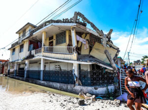 House in ruins after the most recent earthquake in Haiti. Photo courtesy of EFE.