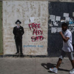 Graffiti in the streets of Caracas with the hashtag #FreeAlexSaab. Photo courtesy of Últimas Noticias.