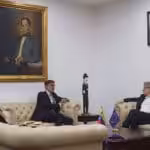 Minister Felix Plasencia talking with the new European Union charge d'affaires. Photo courtesy of MPPRE.