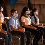 Venezuelan high school students wearing face masks. File photo.