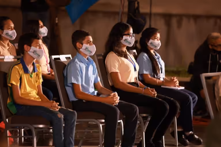 Venezuelan high school students wearing face masks. File photo.
