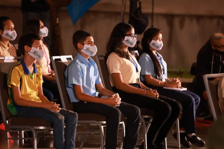 Venezuelan high school students wearing face masks. File photo.
