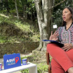 CNE rector Tania D'Amelio being interviewed by Ernesto Villegas. Photo courtesy of Alba Ciudad.