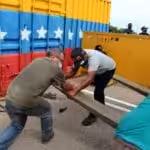 Venezuelan workers removing the containers installed at the Simon Bolivar international bridge, to prevent the force entry of alleged humanitarian aid that ended up being material for violent riots on February 2019. Photo courtesy of Twitter / @FreddyBernal.