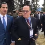 Former deputy Guaido following Julio Borges during an event with Colombian authorities, complicit like them in the looting of Monomeros. File photo courtesy of Caraota DIgital.