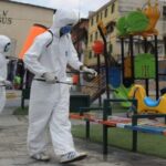 Healthcare workers sanitizing a playground in a Venezuelan school. Photo courtesy of RedRadioVE.