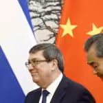 Chinese Foreign Affairs Minister Wang Yi and Cuban Foreign Minister Bruno Rodriguez leave after a news conference at Diaoyutai state guesthouse on May 29, 2019 in Beijing, China. File photo courtesy of FLORENCE LO/POOL/GETTY IMAGES.