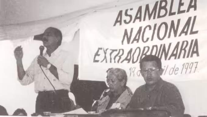 William Izarra along Hugo Chavez on a political assembly  in 1997, a few months before Hugo Chave's first term as President of Venezuela. File photo courtesy of Alba Ciudad.