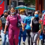 Venezuelans responsibly wearing face mask in public places to fight COVID-19. File photo.