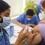 Woman being vaccinated against COVID-19 in Venezuela. File photo.