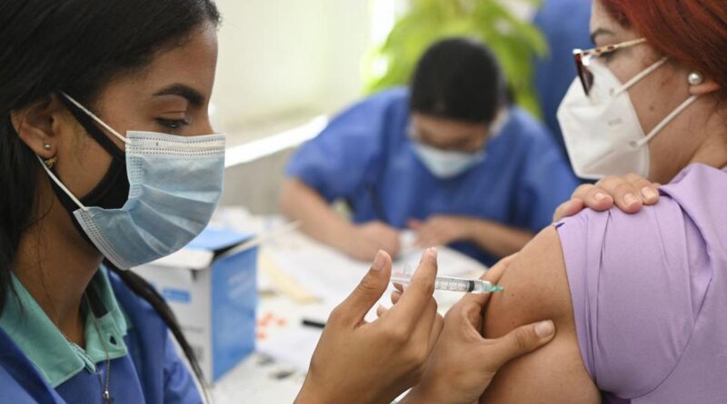 Woman being vaccinated against COVID-19 in Venezuela. File photo.