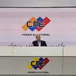 Pedro Calzadilla, CNE President, reading the second report of the 21N regional elections. Photo by CNE.