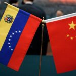 Venezuelan and Chinese tablestand flags. File photo.