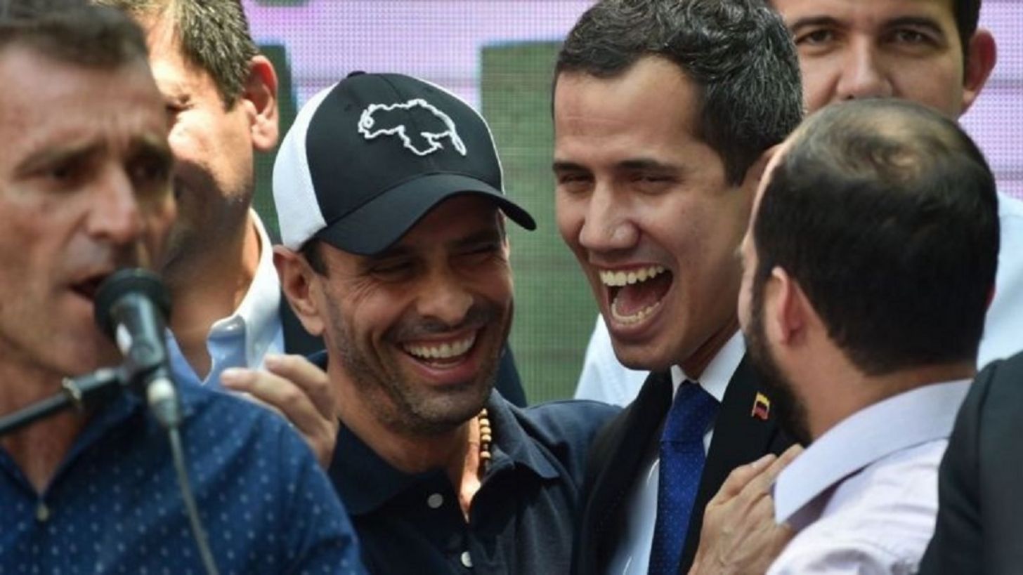 Henrique Capriles and former deputy Guaido laughing out loud a few months ago. Photo by Getty Images.