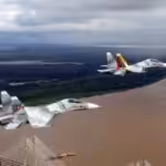 Two Venezuelan Su-32 fighter jets flying over the Orinoco river near Ciudad Guayana. File photo.