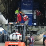 Sputnik Light vaccines arriving from Russia being unloaded at the Simon Bolivar international airport in Maiquetia. Photo by Twitter / @EmbajadaRusaVen.