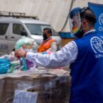 ONU Migration officer collecting donations for migrants. File photo.