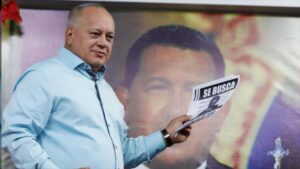 PSUV deputy Diosdado Cabello holding a "Wanted" poster during his TV show Con EL Mazo Dando. Photo by Con el Mazo Dando.