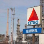 CITGO logo with one of its refineries in the United States. File photo.