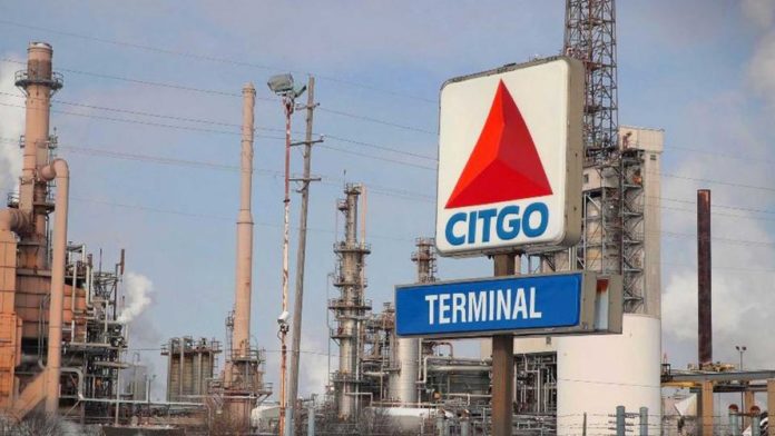 CITGO logo with one of its refineries in the United States. File photo.