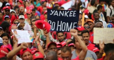 A person holds a banner reading "Yankee Go Home" at an anti-imperialist demonstration in Venezuela. File photo.