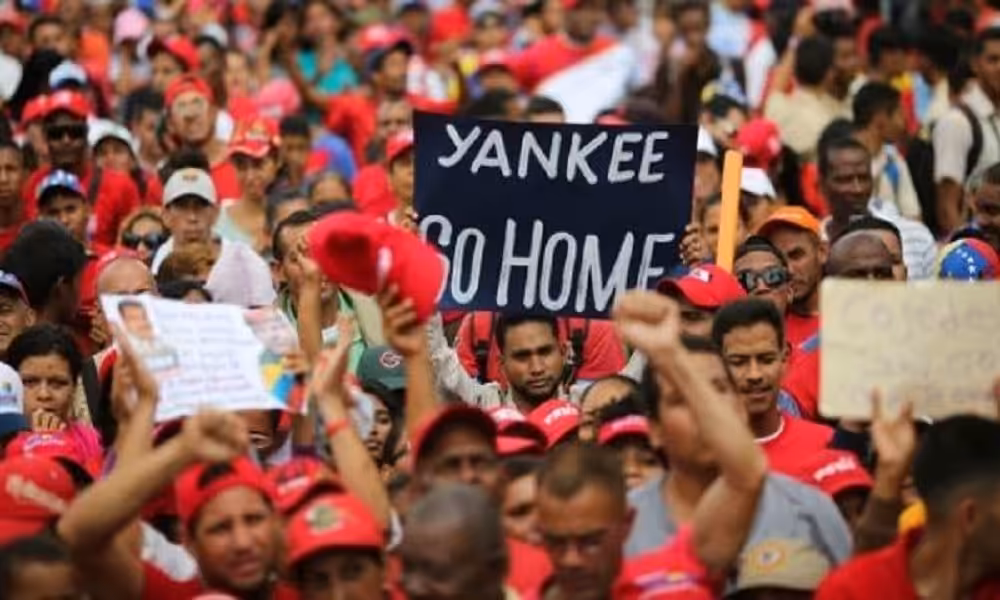A person holds a banner reading "Yankee Go Home" at an anti-imperialist demonstration in Venezuela. File photo.