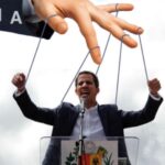 Photo composition with former deputy Guaido displayed as a CIA puppet. Photo: Telesur.