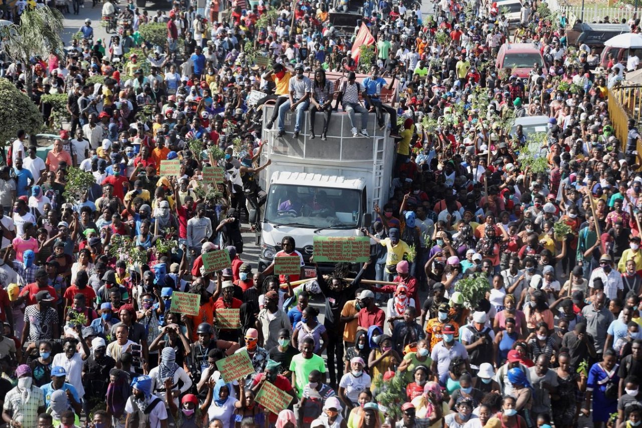 Featured image: Haitians protest along the streets against their country's unstable economic, political and social situation in Port-Au-Prince, Haiti, February 17, 2022. Photo: Reuters/Ralph Tedy Erol.