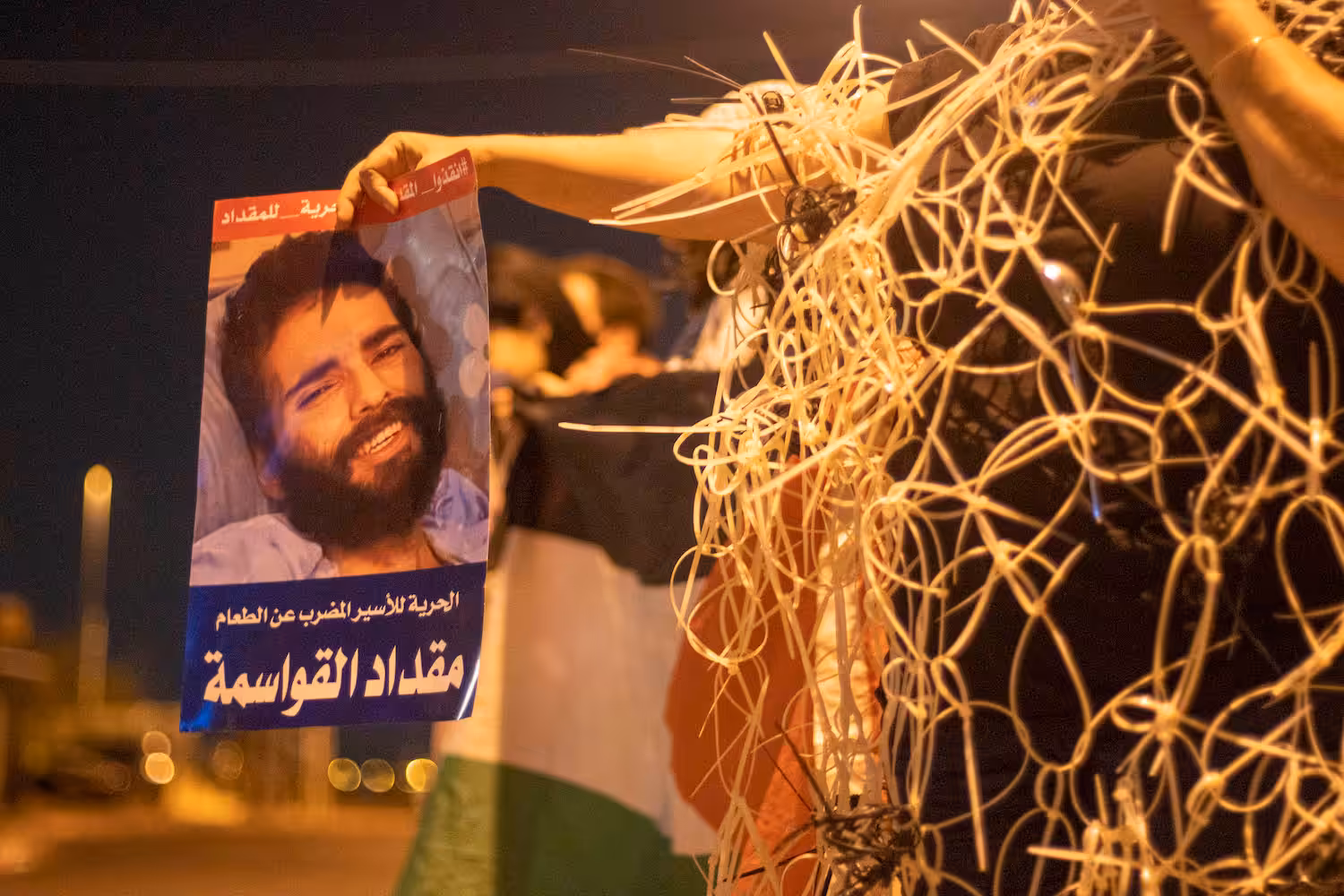 Featured Image: Protesters stand outside of Kaplan Hospital in solidarity with Palestinian prisoners on hunger strike against their administrative detention, central Israel, October 14, 2021. (Heather Sharona Weiss/Activestills)