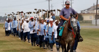 Inmates return from farm work detail at the Louisiana State Penitentiary in Angola, La. Gerald Herbert/AP